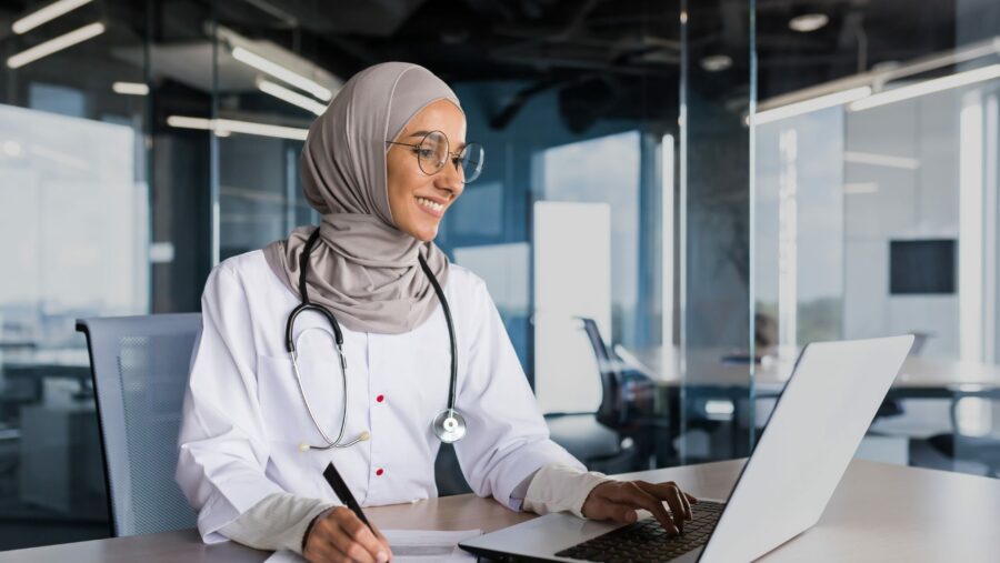 Arab,Muslim,Woman,In,Hijab,Doctor,Working,In,Modern,Clinic